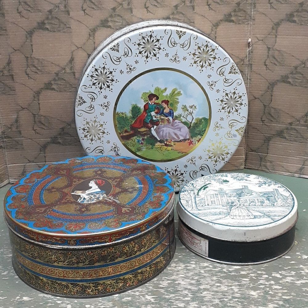 3 pc set of vintage round tins featuring elaborate ladies from the past.